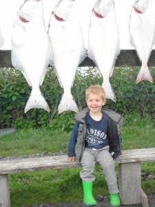 Hunter wanting his picture taken with the Halibut!