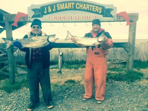 Bob Jensen and Brian Hofrichter show off their catch