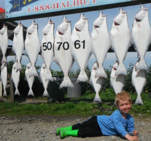 Captain Sarah's little Hunter decided he wanted to have his picture taken with the Halibut too!