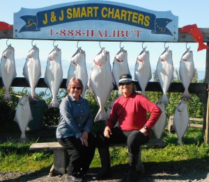 Washboard Willy and Donnis pose with Willy's Halibut.