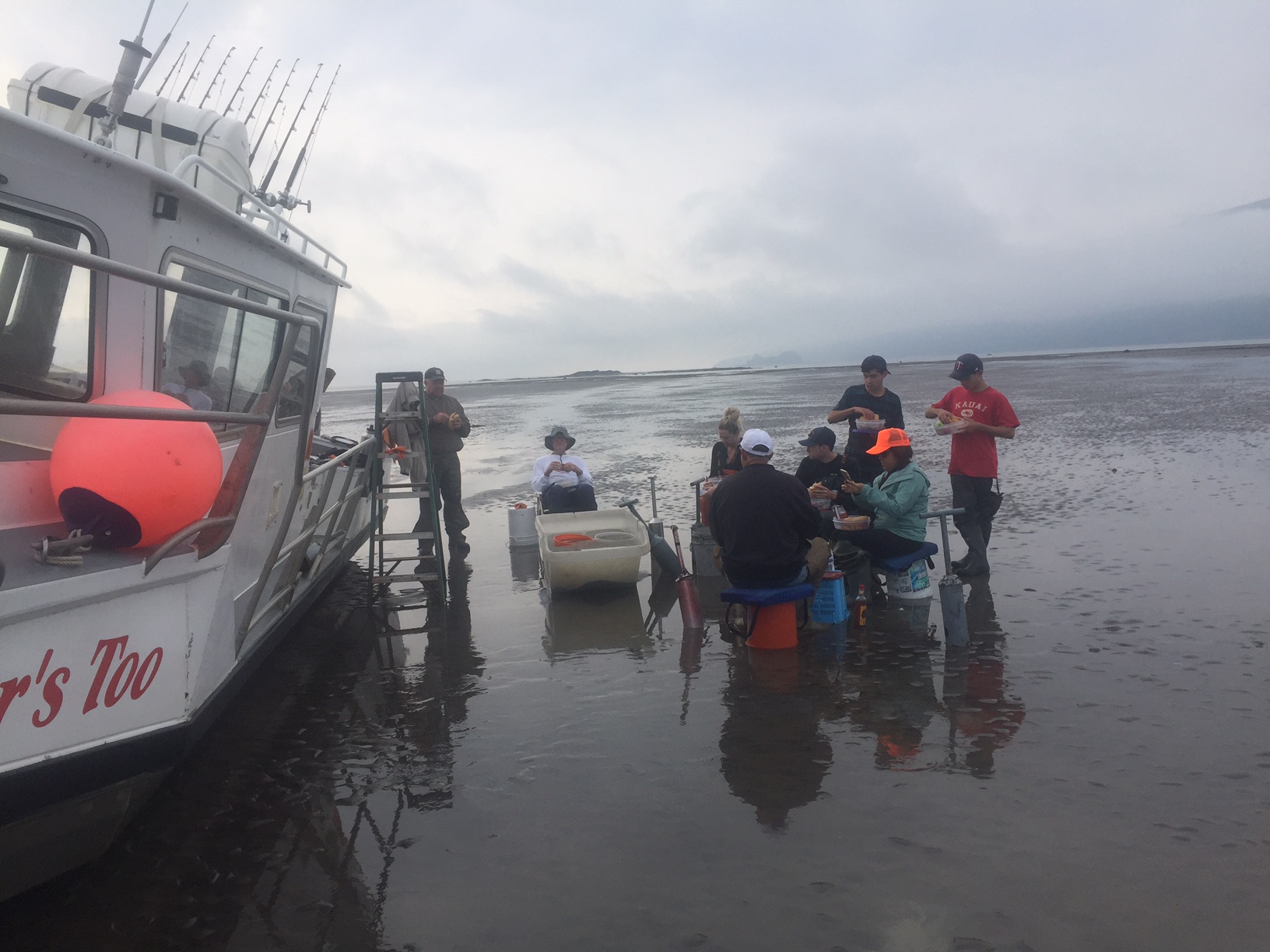 Resting next to boat on clamming trip