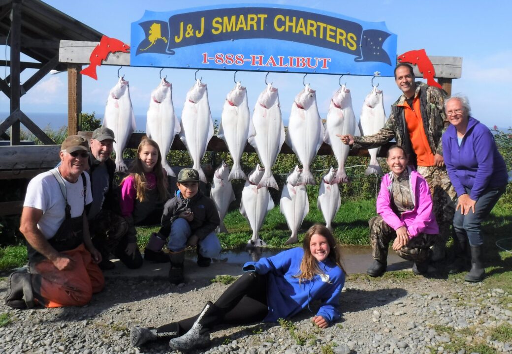 08-24-2020 David's Family Trip posing with their halibut catch