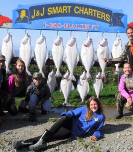 08-24-2020 David's Family Trip posing with their halibut catch
