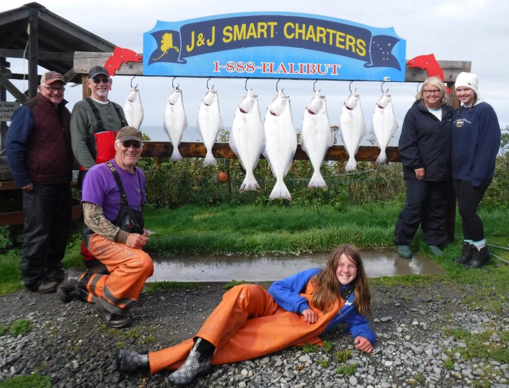 Stowell and Weigel Parties posing with their catch